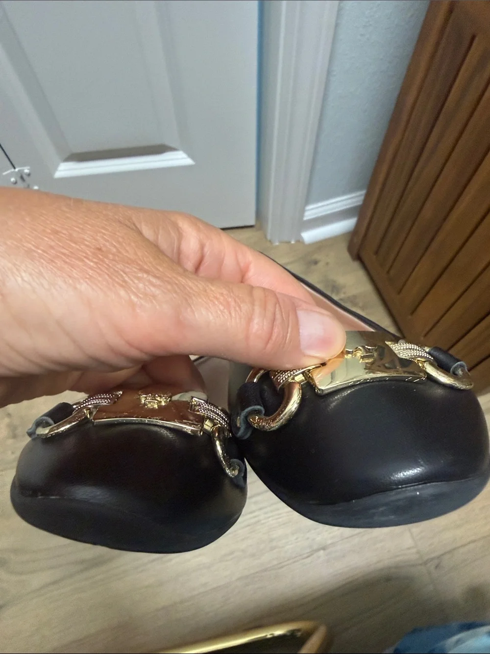kate spade Black Leather Flats with Gold Chain Plaque